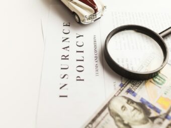 a magnifying glass sitting on top of a piece of paper